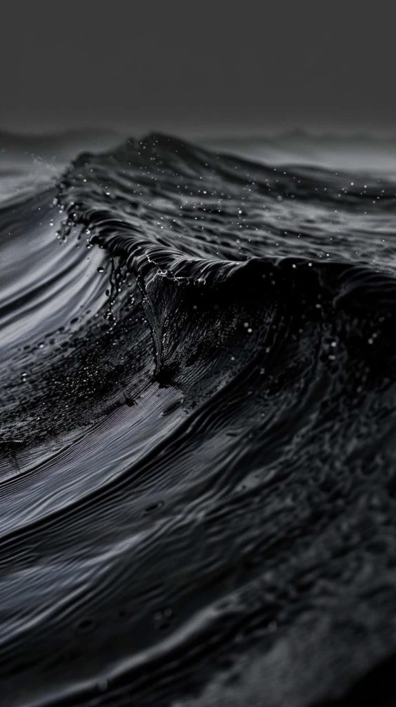 Dark Ocean Waves texture wallpaper showing a high-contrast monochrome curling wave on black background