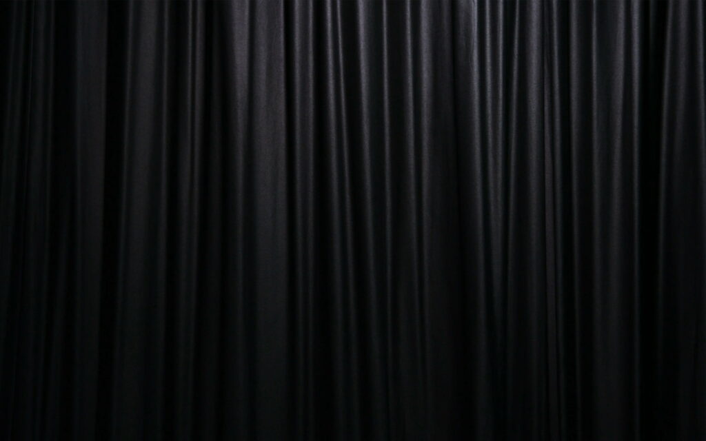 Darkened Pleats: A Stage Set with Textured Lines and Black Textile Curtains Wallpaper
