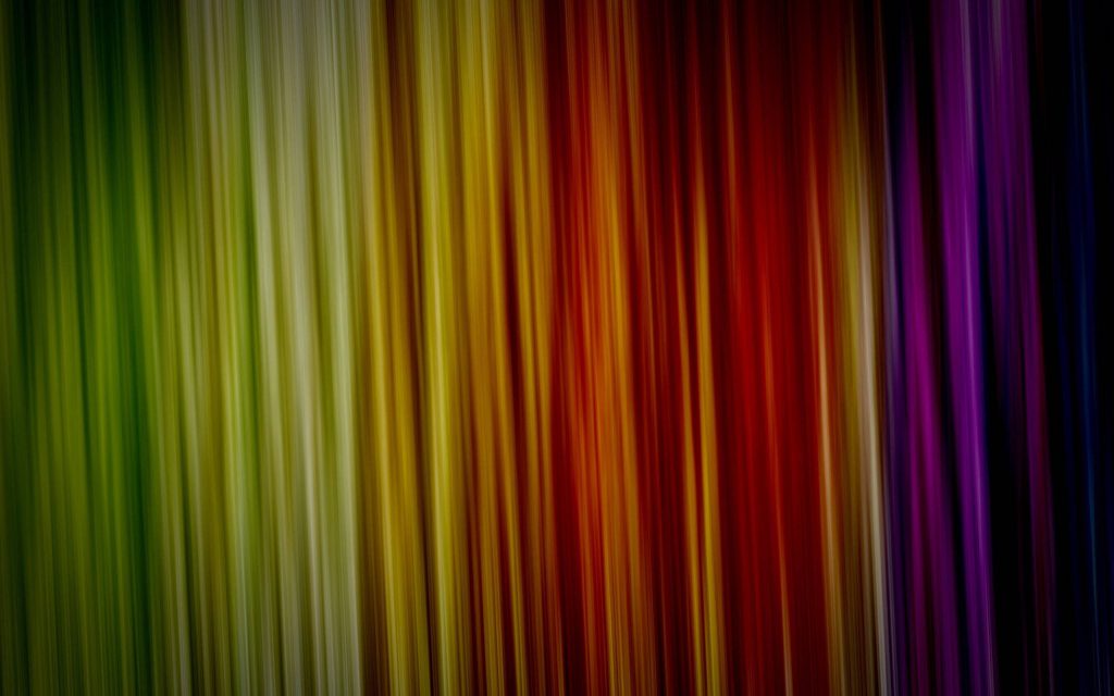 Dark rainbow vertical lines wallpaper with vibrant abstract streaks and sleek motion blur effect