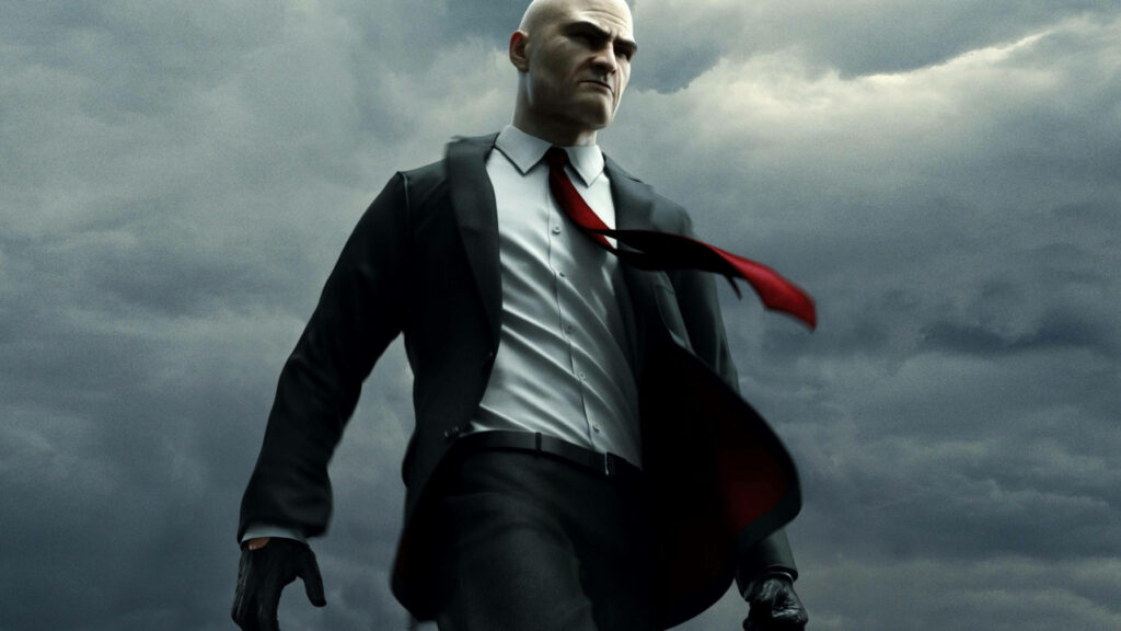 Steely Assassin: Agent 47 Embraces his Shadowy World Wallpaper