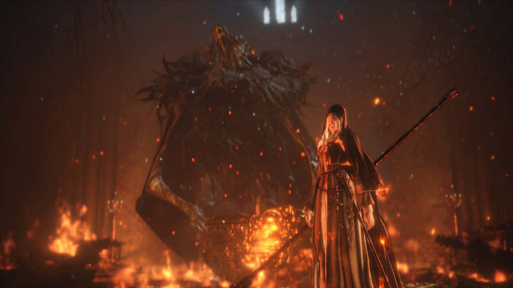 Dark Souls III Fire Keeper in fiery glow with massive skeletal figure dark fantasy wallpaper