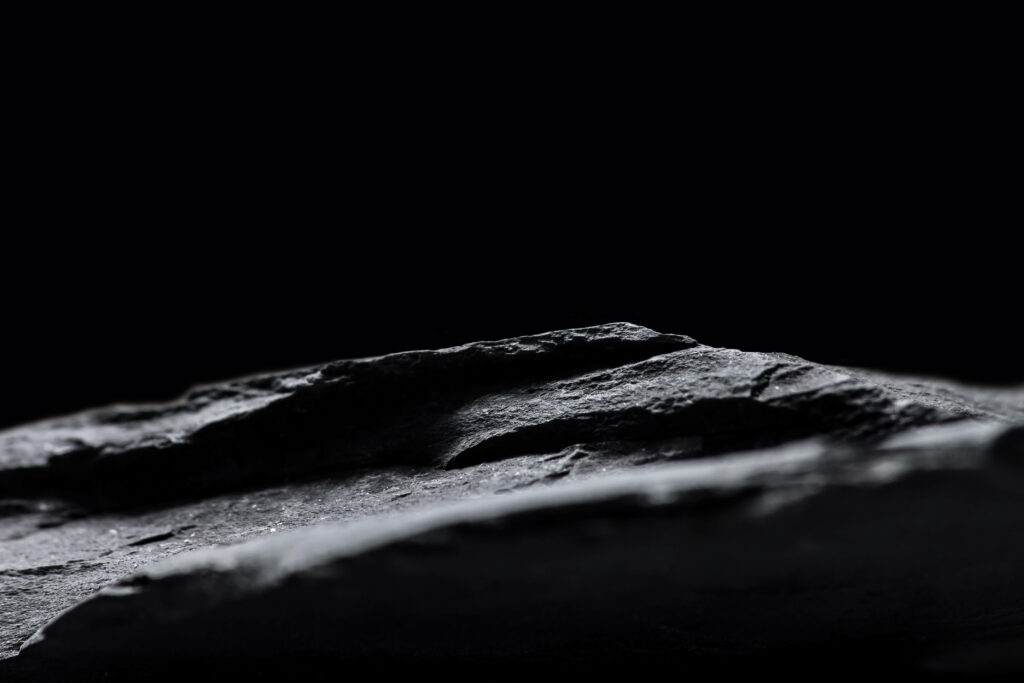 Dark Textured Rock Wallpaper: Minimalist Abstract Art Background