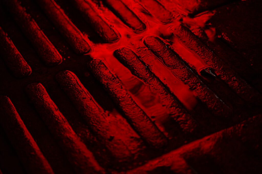 Dark Textured Wallpaper with Vivid Red Glow - Moisture & Depth