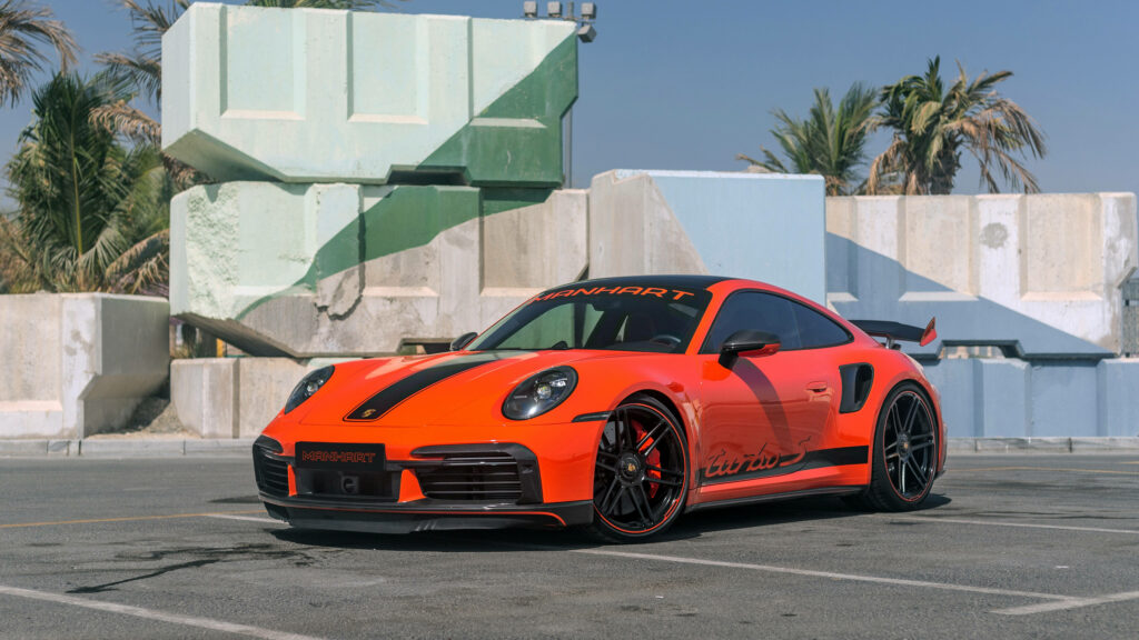 Dark Orange Beast: A Porsche Manhart 5120x1440 Wallpaper for Speed Enthusiasts