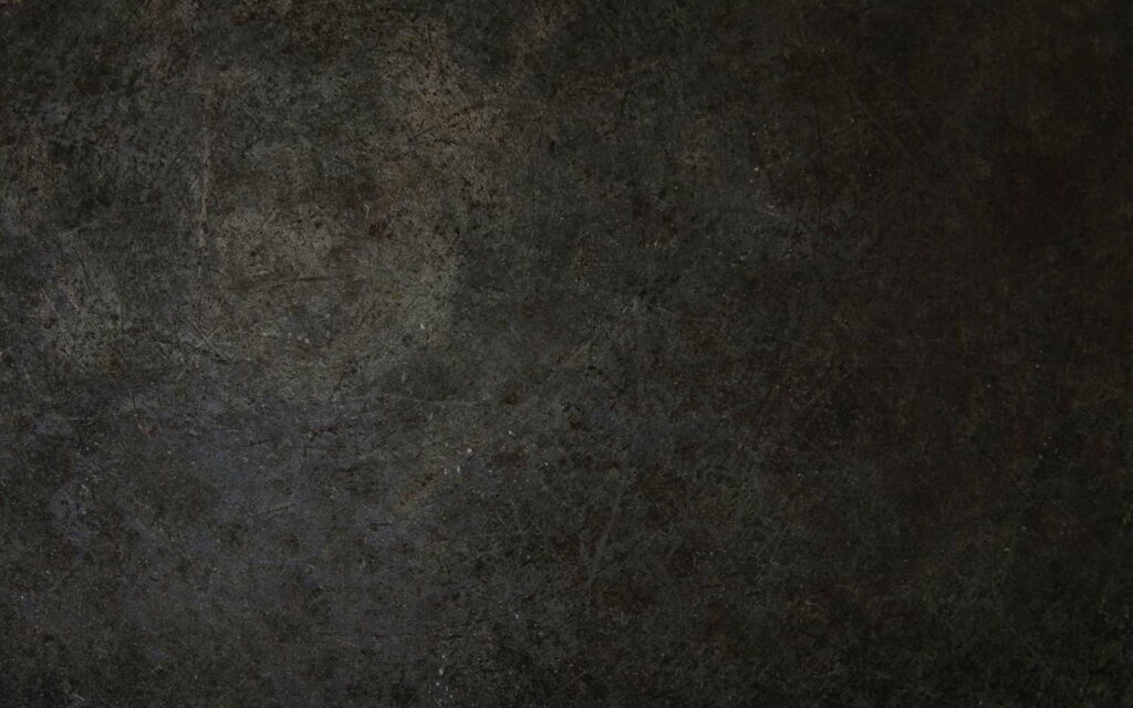 Eerie Noir: A High-Definition Grunge Stone Texture Wallpaper