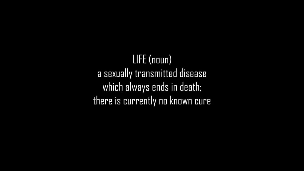 Dark Humor Wallpaper: Life Defined as a Disease on Black Background