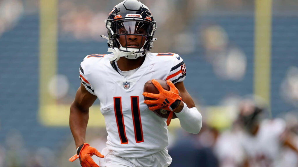 Darnell Mooney in Chicago Bears jersey number 11 sprinting on field vibrant team colors wallpaper
