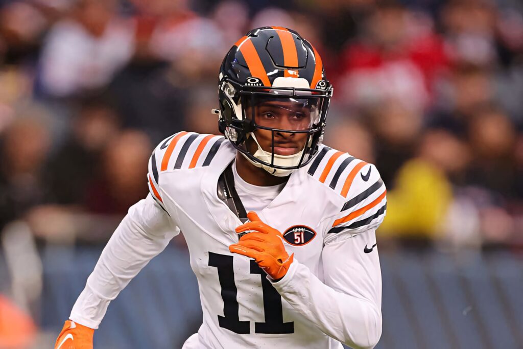 Darnell Mooney number 11 in white Chicago Bears jersey making a dynamic football play action shot Wallpaper