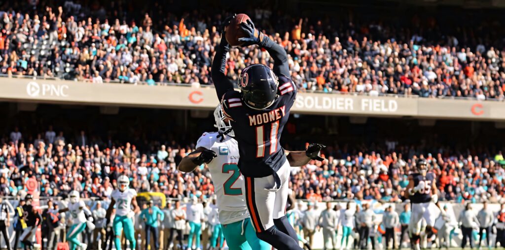 Darnell Mooney Chicago Bears leaping catch in end zone at Soldier Field NFL game action wallpaper background