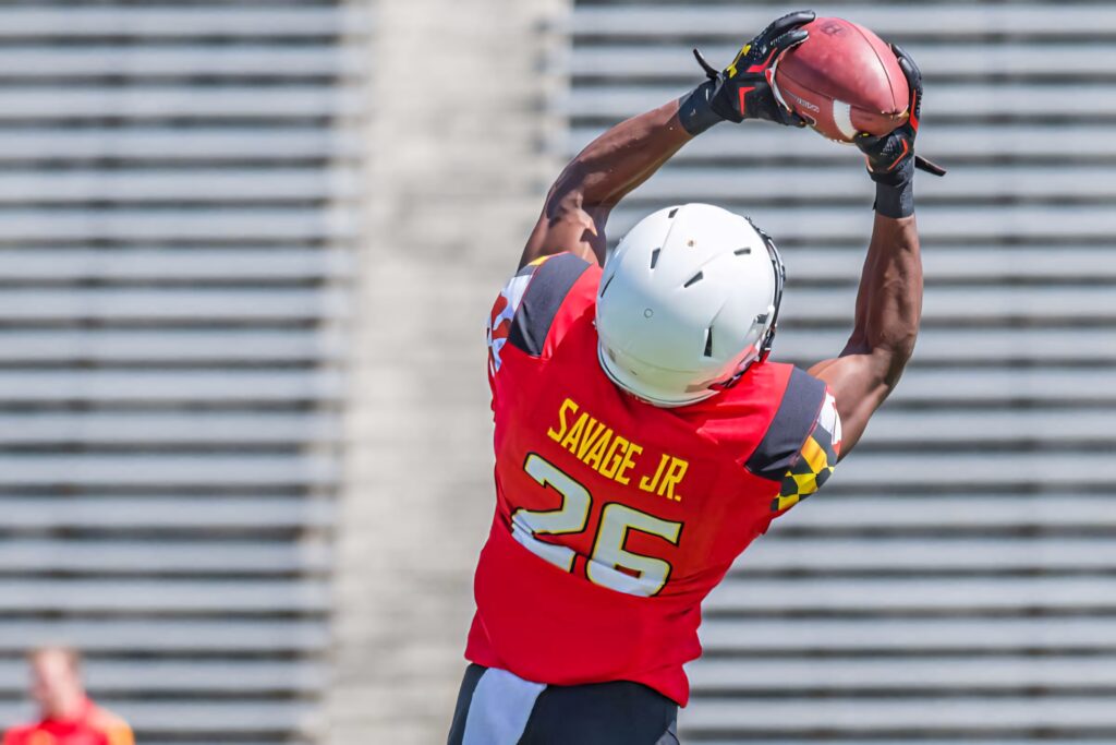 Darnell Savage Jr in red jersey leaping to catch football dynamic wallpaper action shot