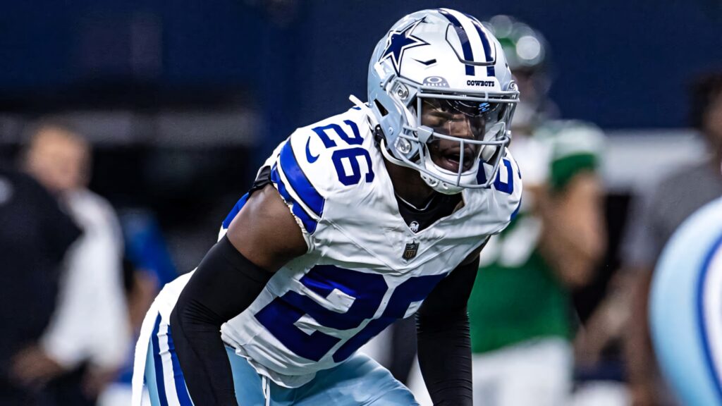 Daron Bland Dallas Cowboys focused football player intense game day action dynamic energy wallpaper