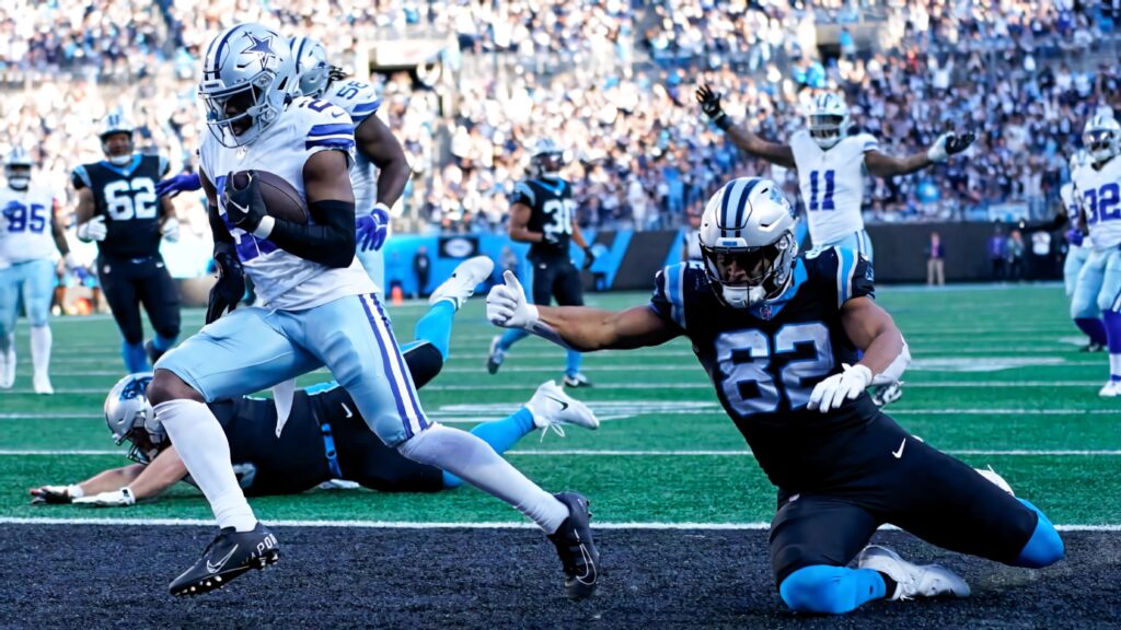 Daron Bland intercepts ball at goal line in Dallas Cowboys vs Carolina Panthers NFL game action wallpaper