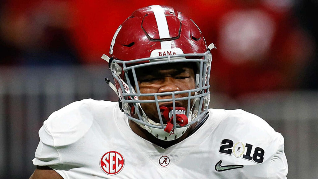 Daron Payne intense football action in Alabama Crimson Tide uniform vibrant dynamic sports wallpaper
