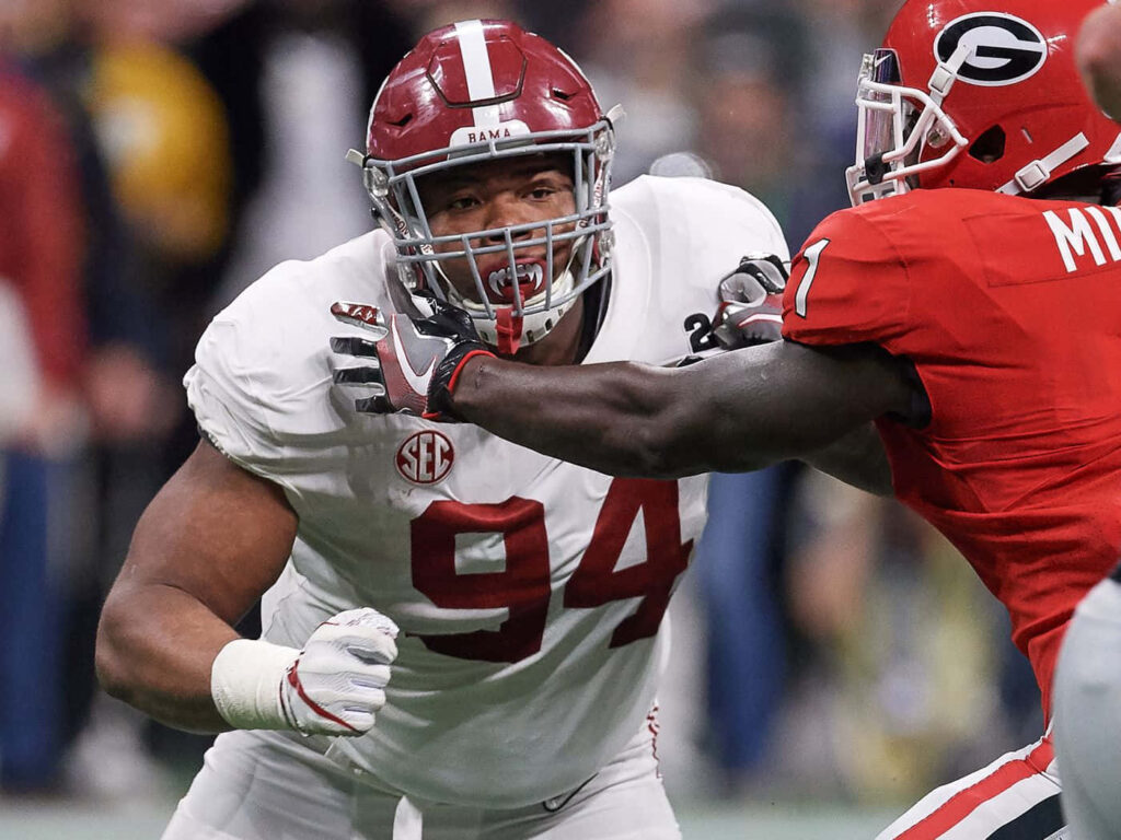 Daron Payne Alabama No 94 in intense defensive action college football crimson white jersey Wallpaper