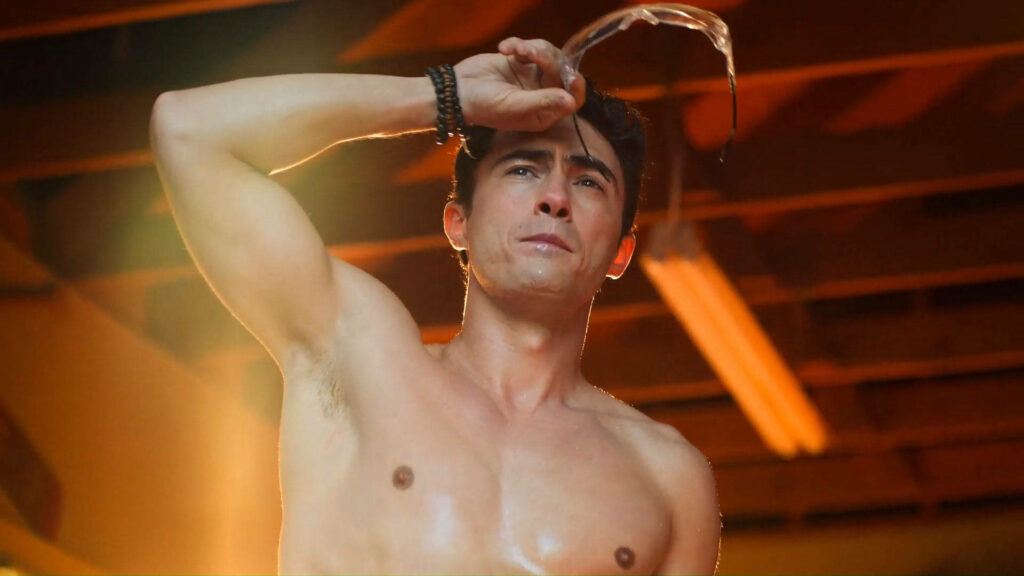 Darren Barnet shirtless intense pose sweat glistening industrial warm lighting wallpaper background
