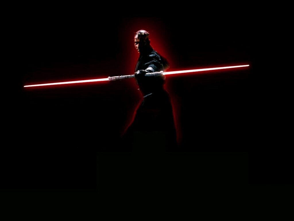 Darth Maul with double-bladed red lightsaber in dark void Star Wars wallpaper background