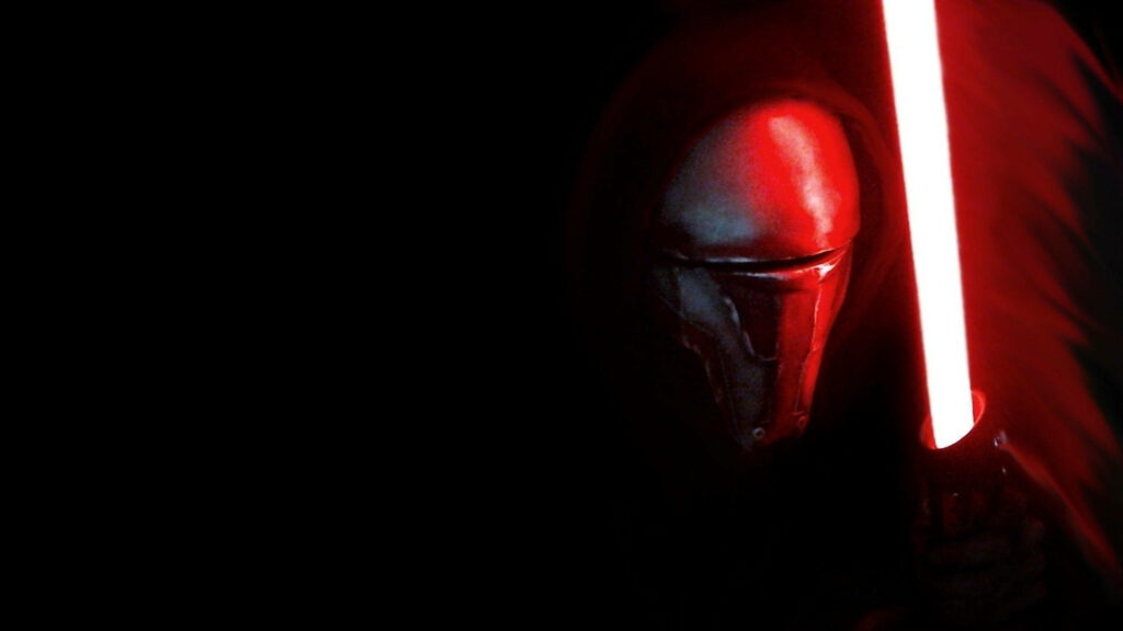 Darth Revan with glowing red lightsaber and mask in dark Sith Lord Old Republic wallpaper background