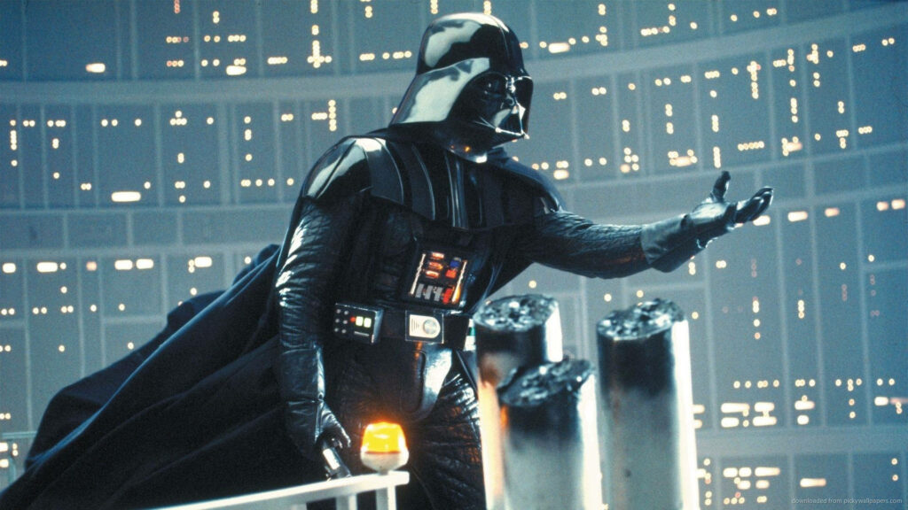 Darth Vader reaching out in spaceship with futuristic control panels and dramatic lighting wallpaper