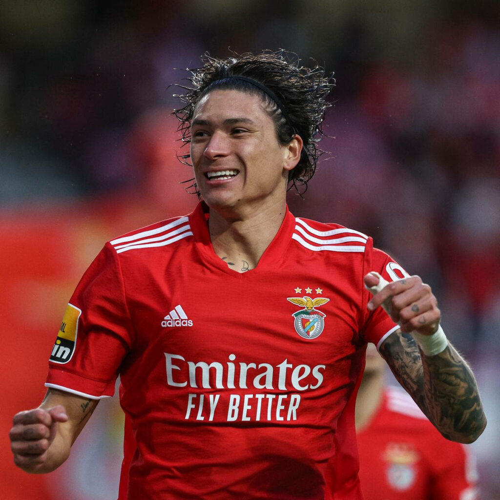 Darwin Núñez in Benfica red kit showing determination with stadium lighting intense passion wallpaper