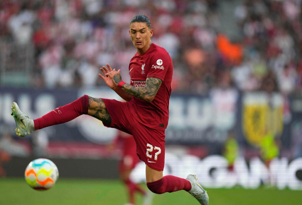 Darwin Núñez Liverpool high kick controlling ball dynamic motion football match action Wallpaper
