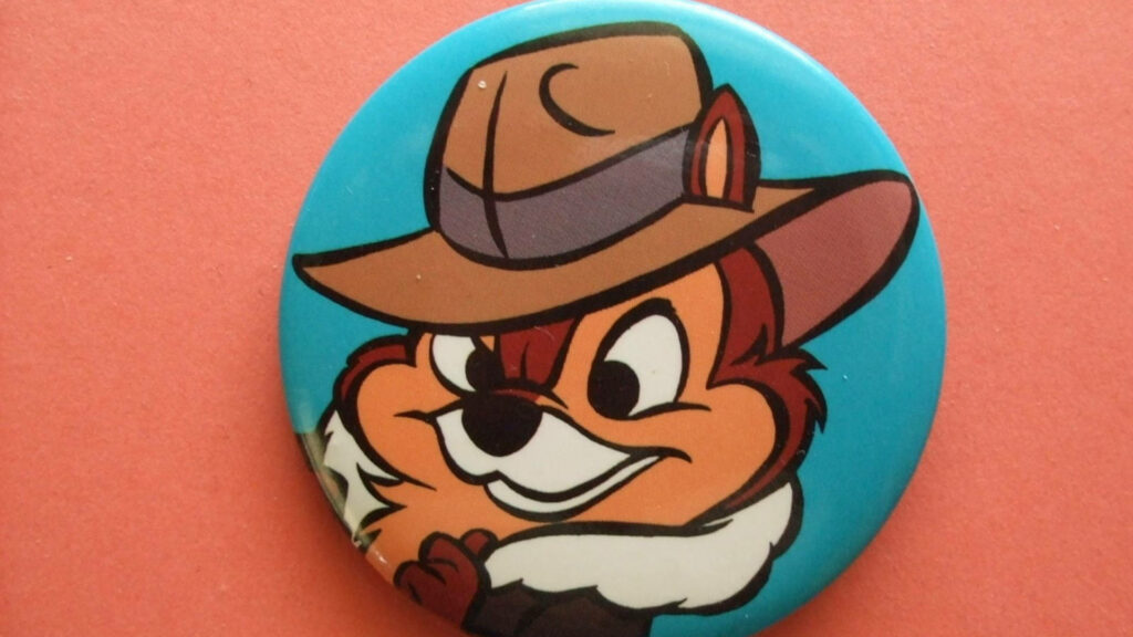 Dashing Chip from Chip N Dale Rescue Rangers wearing fedora with vibrant adventurous background Wallpaper