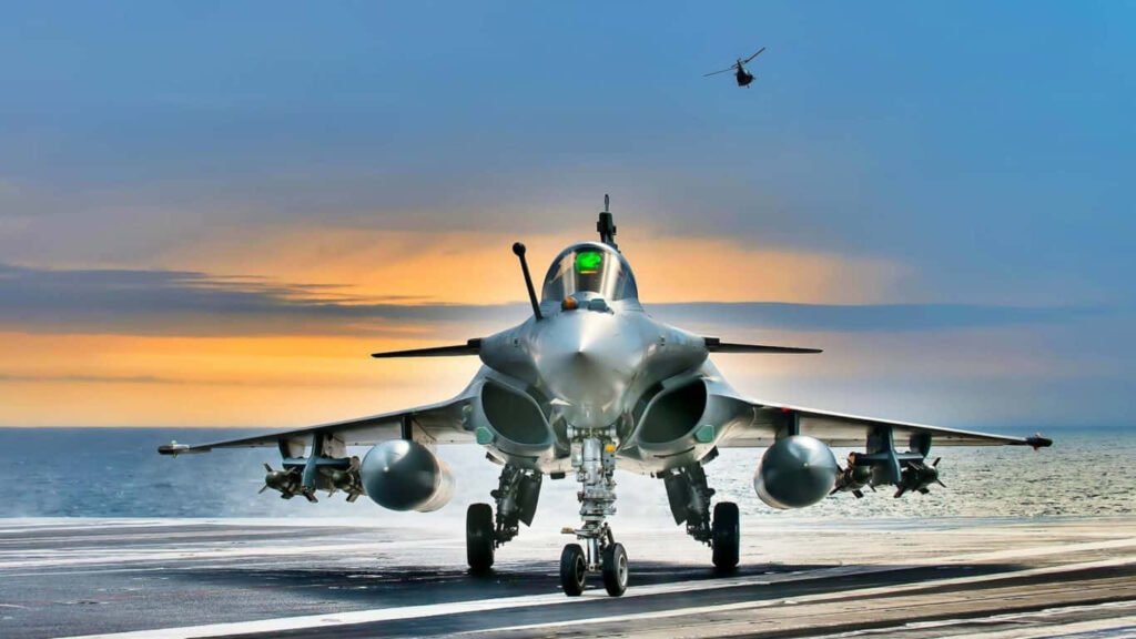 Sunset Landing: Dassault Rafale Jet With Helicopter in Jumbo Jets Background Wallpaper