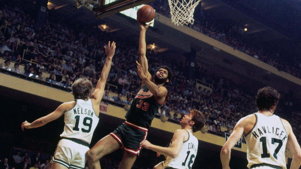 Dave Cowens Boston Celtics defending a layup in dynamic classic NBA game action wallpaper background