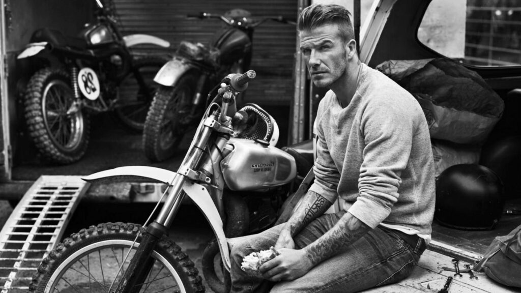 David Beckham on Motorcycle: Stylish Adventure Wallpaper Background