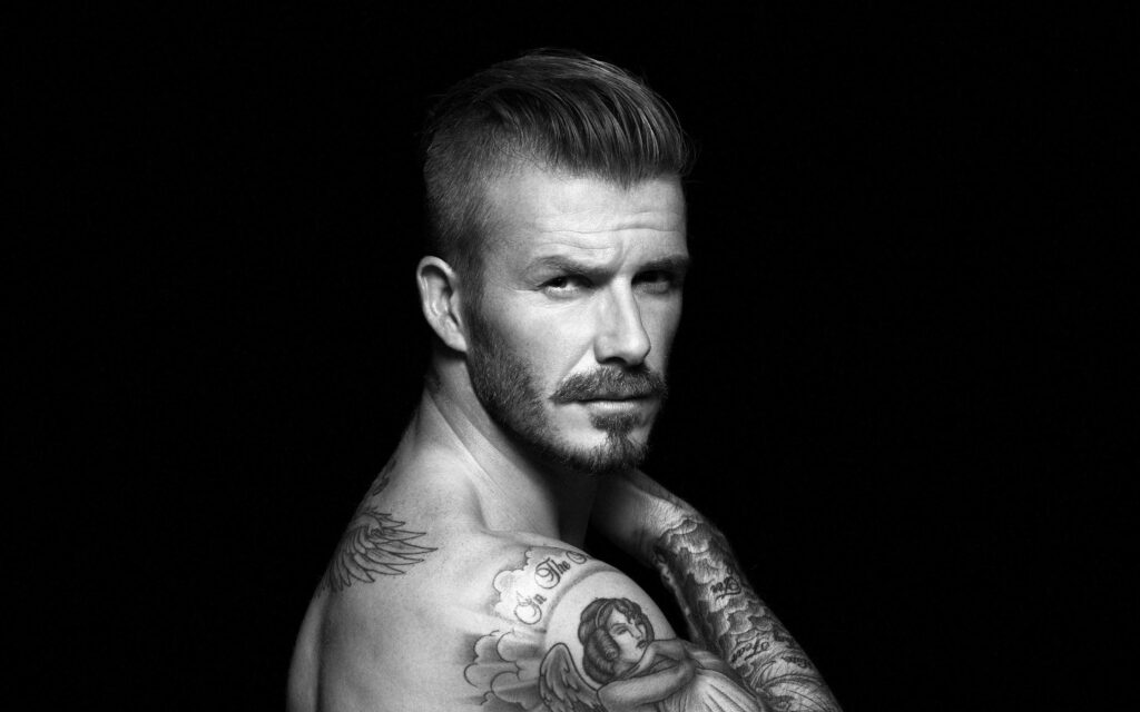 David Beckham's Striking Tattoo Collection Wallpaper Background