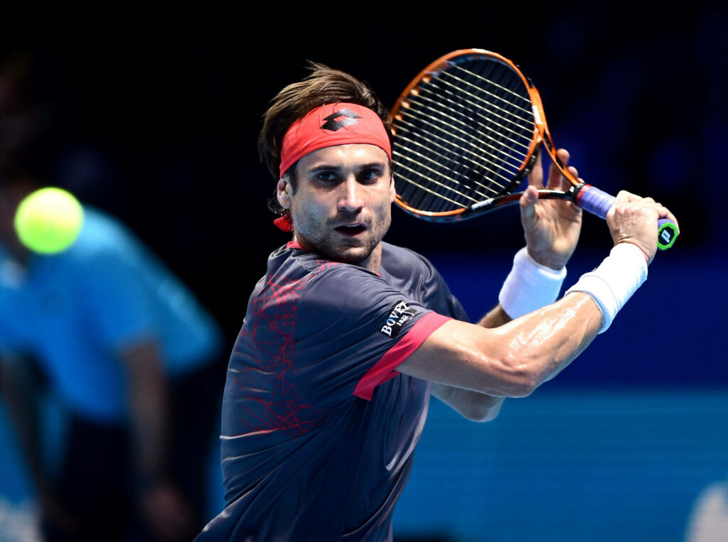 David Ferrer mid-backhand tennis action intense focus dynamic posture blue grey tones wallpaper