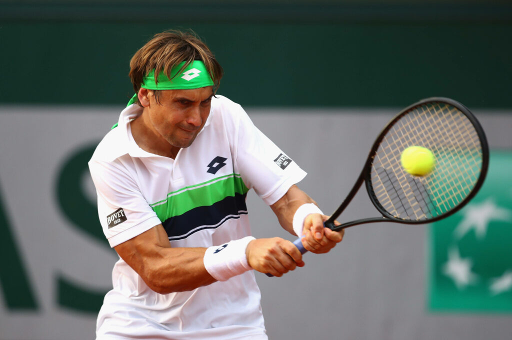 David Ferrer intense tennis action wallpaper vivid green white tones athletic focus motion