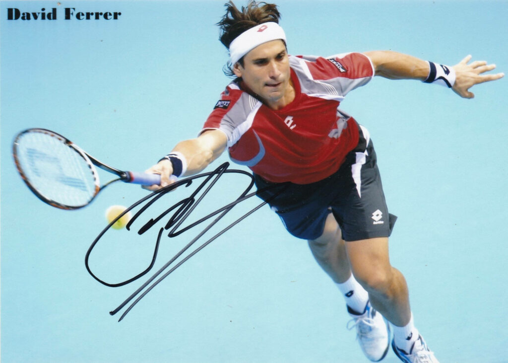 David Ferrer mid-shot on bright blue tennis court in red white outfit with bold autograph wallpaper