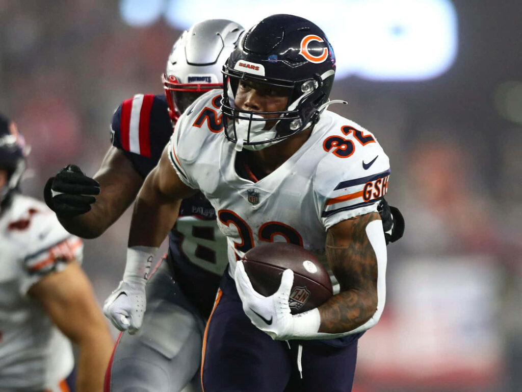 David Montgomery Chicago Bears running intense focus stadium lights bold team colors wallpaper