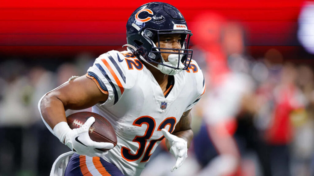 David Montgomery Chicago Bears running with football in navy orange white uniform NFL game action Wallpaper