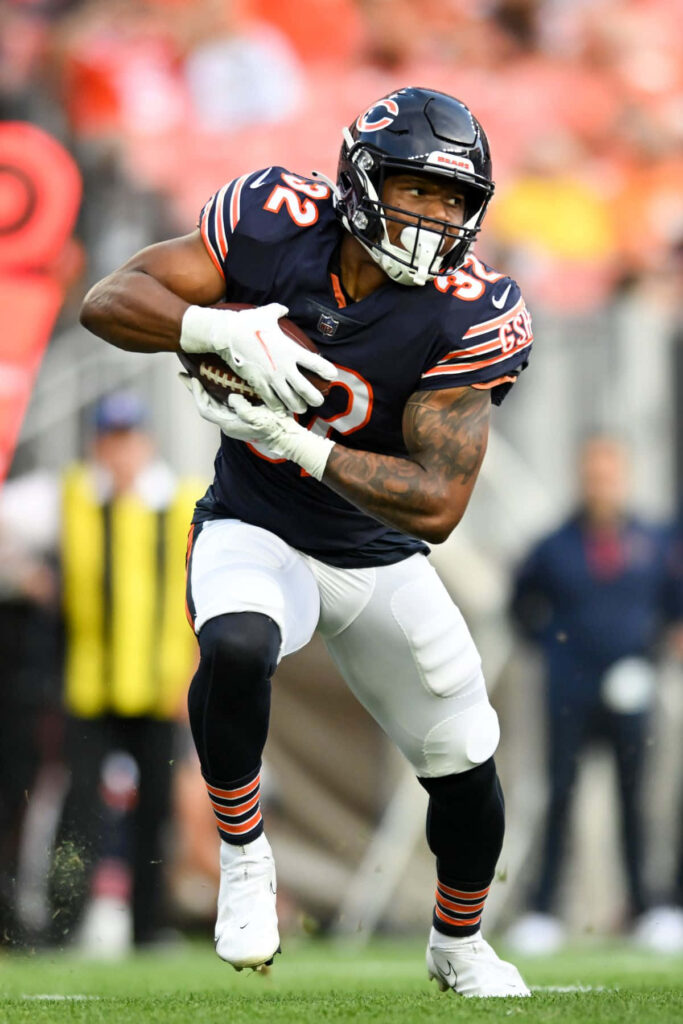 David Montgomery Chicago Bears running back charging forward in navy blue orange uniform NFL action Wallpaper