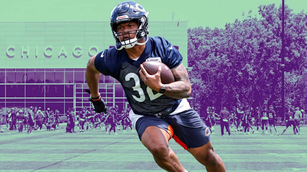 David Montgomery Chicago Football action shot running with intensity on vibrant two-tone background Wallpaper