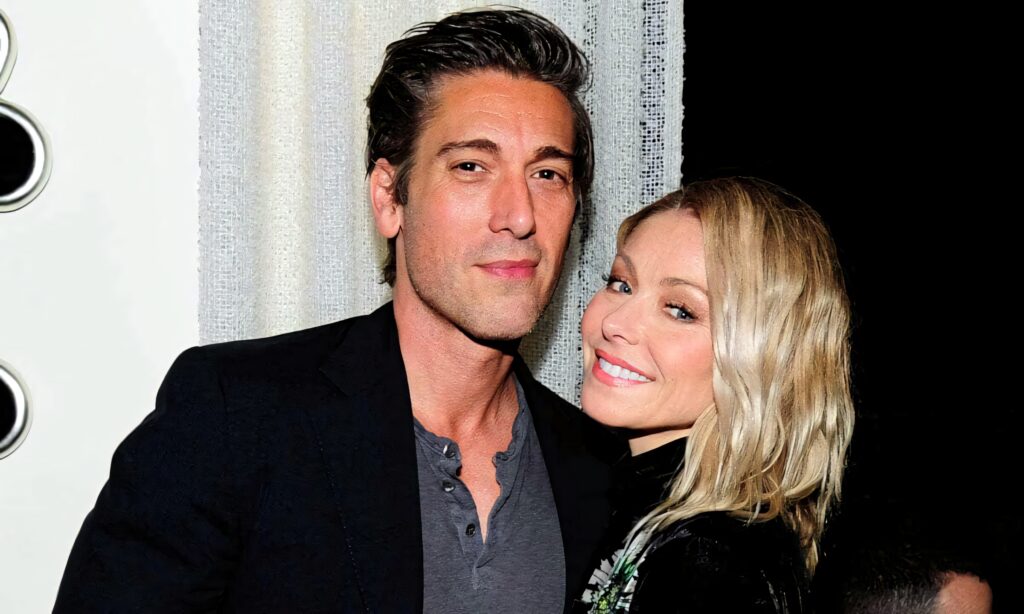 David Muir and Kelly Ripa stylishly posed in warm modern setting vibrant wallpaper background