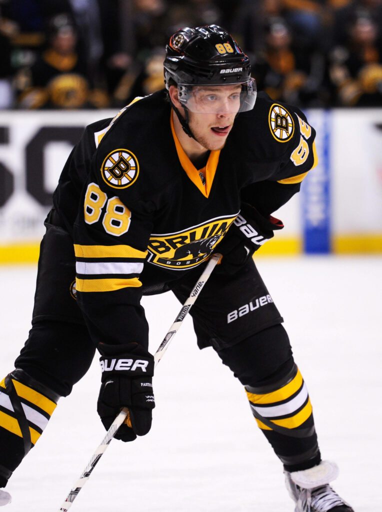 David Pastrnak Boston Bruins intense hockey action 2016 game vs Washington Capitals on ice Wallpaper