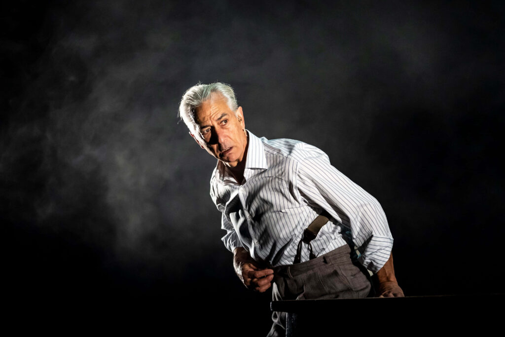David Strathairn in dramatic lighting smoky background striped shirt suspenders cinematic style Wallpaper
