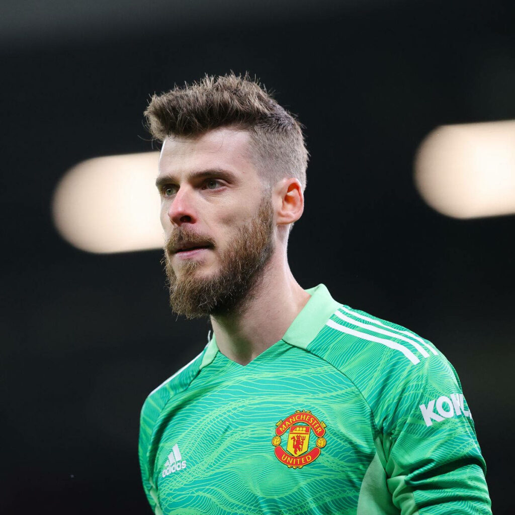David de Gea in green Manchester United goalkeeper jersey with intense focused expression Wallpaper