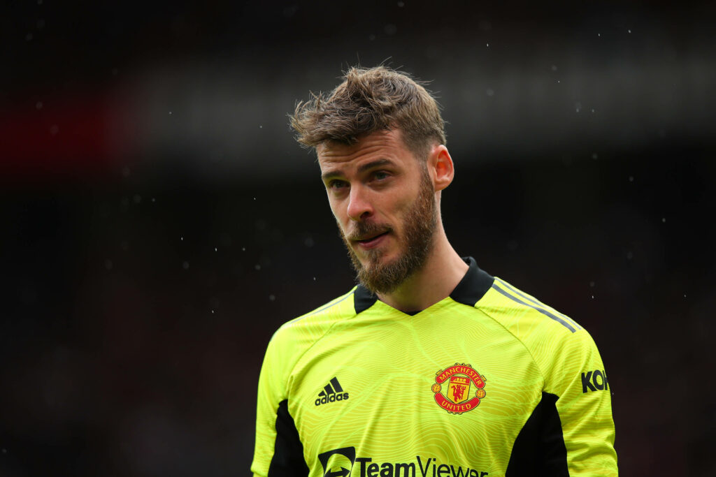 David de Gea close-up in neon yellow Manchester United goalkeeper kit intense focused face Wallpaper