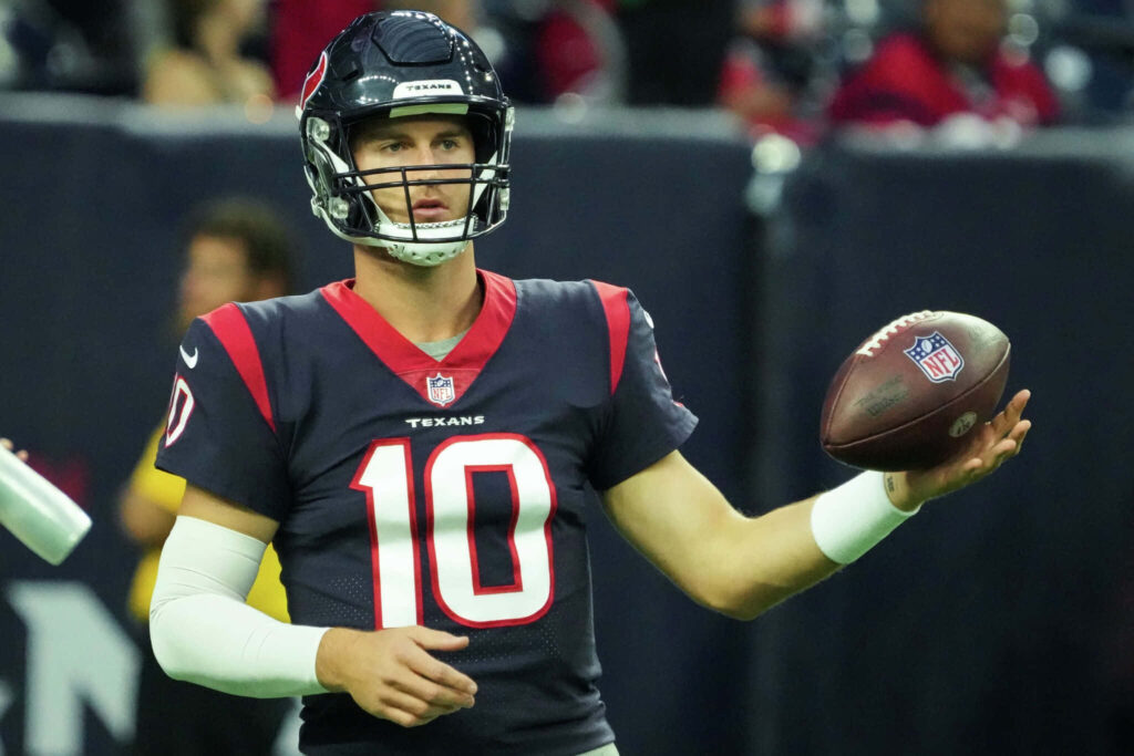 Davis Mills Houston Texans quarterback number 10 focused on field ready to throw football wallpaper