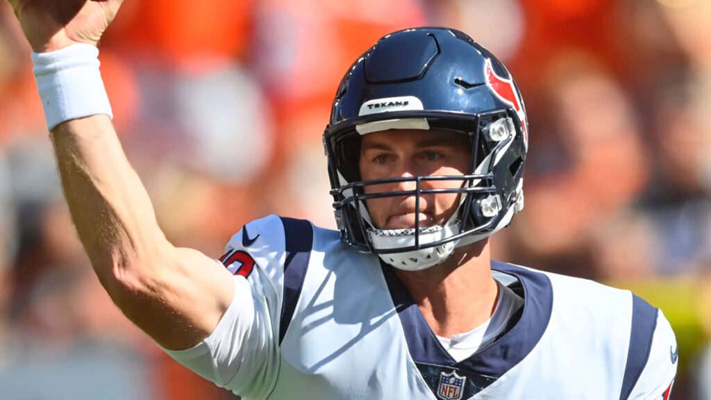 Davis Mills Houston Texans quarterback mid-throw action dynamic football wallpaper background