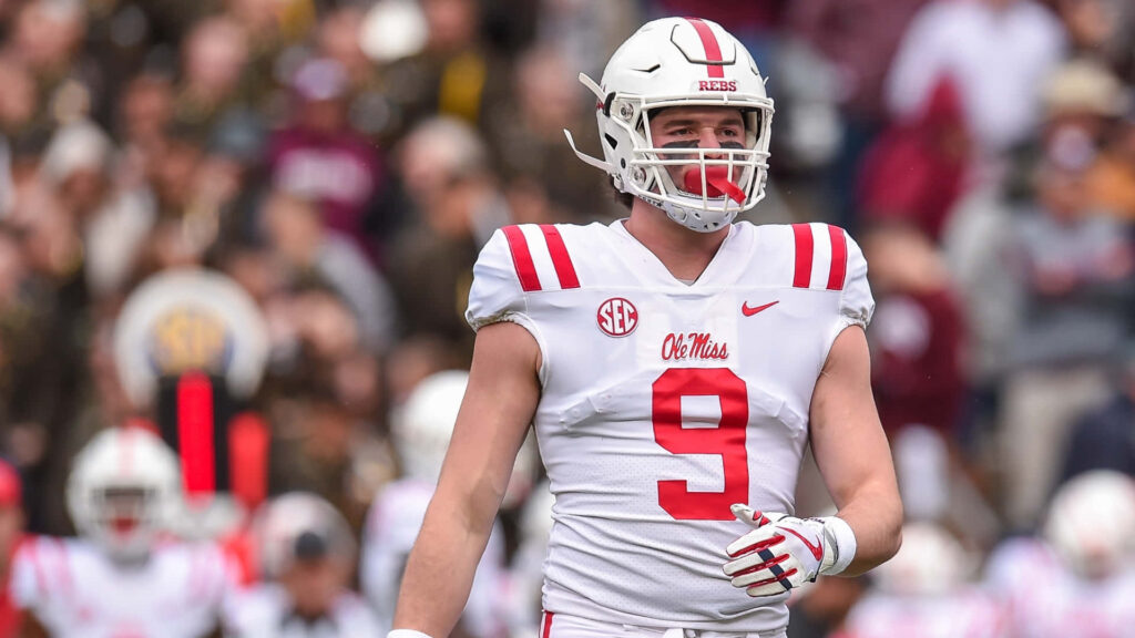 Dawson Knox Ole Miss football uniform number 9 action shot stadium athletic intensity wallpaper