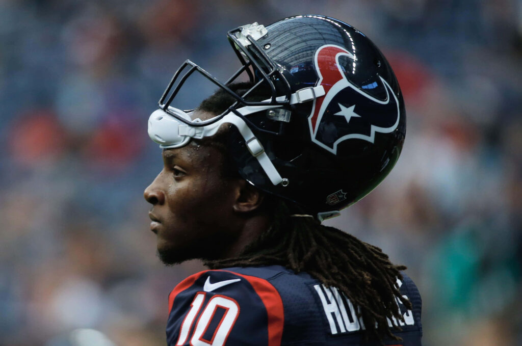 DeAndre Hopkins focused profile in Houston Texans uniform with helmet lifted detailed wallpaper