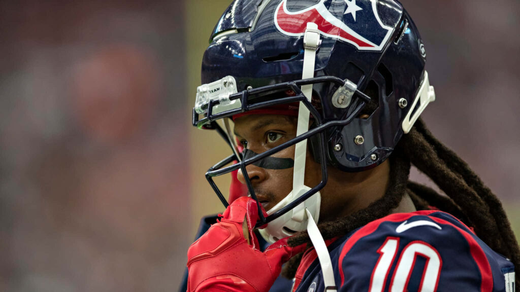 DeAndre Hopkins Houston Texans number 10 intense focus vivid red gloves dynamic NFL wallpaper