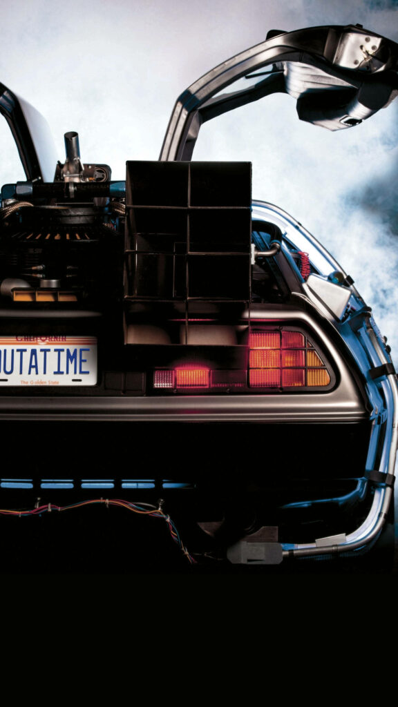 DeLorean car with gullwing doors open and OUTATIME plate in misty dramatic Back to the Future wallpaper