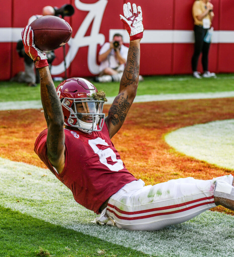 DeVonta Smith celebrating Alabama touchdown catch in crimson uniform vibrant stadium action Wallpaper