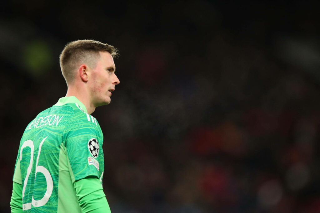 Dean Henderson goalkeeper in green jersey with name and number sharp stadium background wallpaper