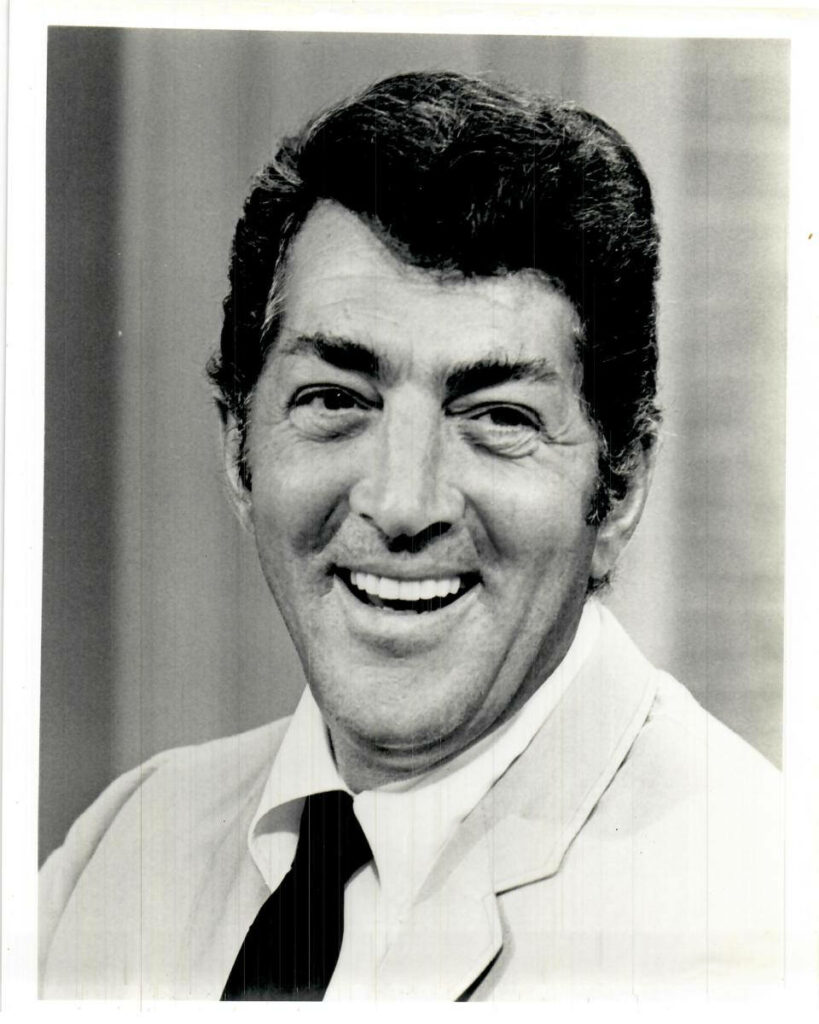 Dean Martin greyscale portrait with charming smile vintage mid century style wallpaper background